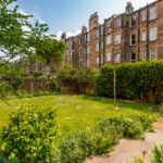 Green yard, historic residences.