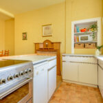Kitchen with yellow walls.