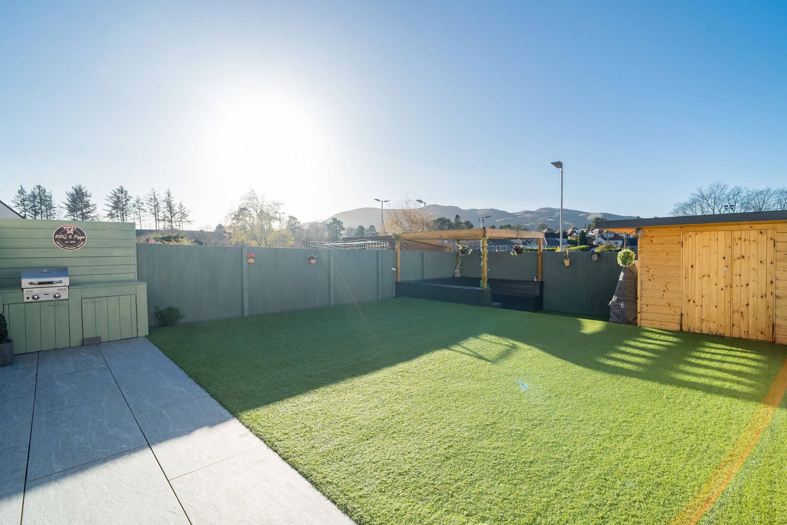 Back garden with artificial grass