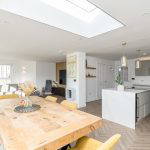 Open-plan living and kitchen area with modern decor