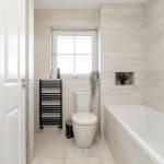 Modern bathroom with white tiles