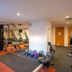 Fitness room with exercise machines and equipment